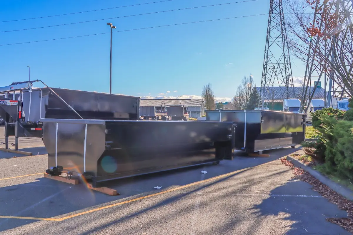 Roll-off dumpster ready for waste disposal at job site for Concrete Dumpster Rental in Sweetwater